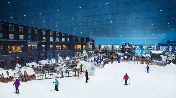 Indoor ski slopes at Ski Dubai inside Mall of the Emirates, featuring real snow, skiing activities and winter attractions.