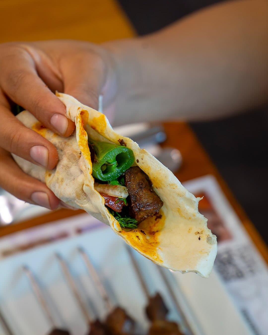 Turkish liver kebab wrapped in flatbread with grilled peppers at Kapadokya Turkish Kitchen Dubai