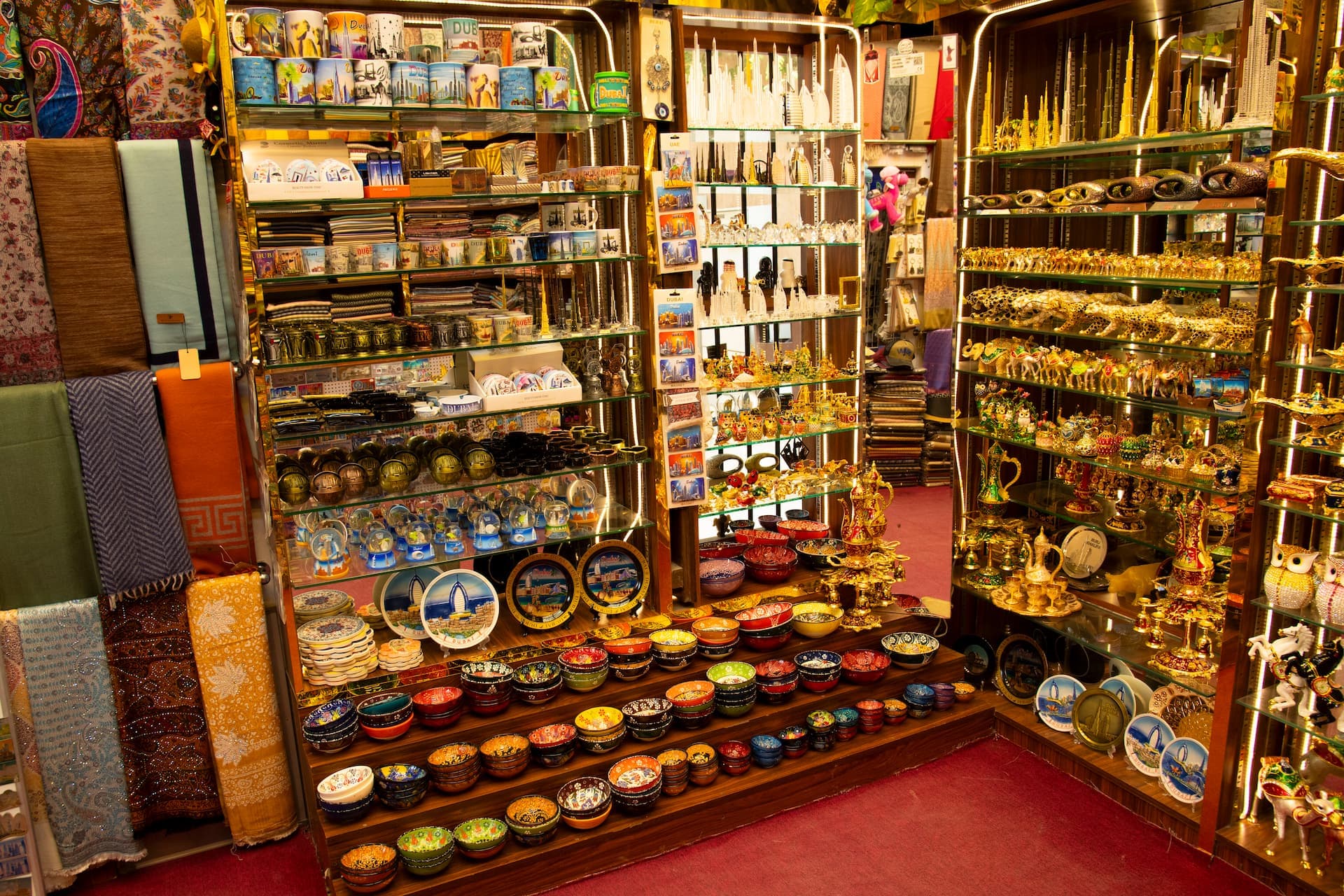 Dubai souvenir shop interior with mugs, decorative bowls, and keepsakes at Al Fahidi Historical Neighbourhood Bur Dubai