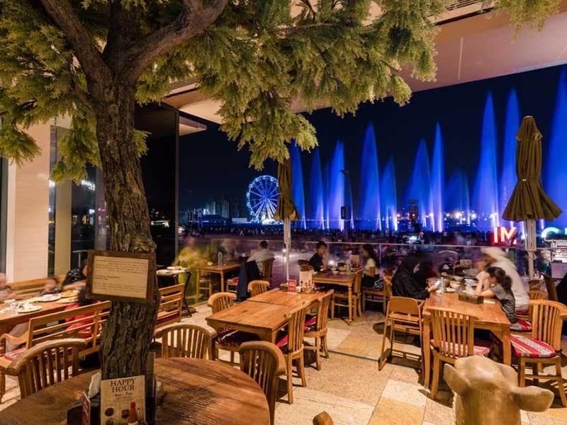 Enjoy a relaxing dining experience at Festival Bay, surrounded by restaurants and stunning waterfront views.